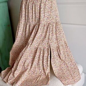 Beautiful pull on maxi skirt with side slit.
